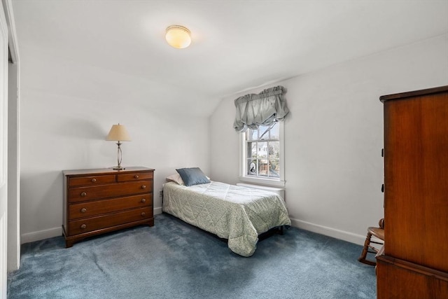 bedroom with carpet, lofted ceiling, and baseboards