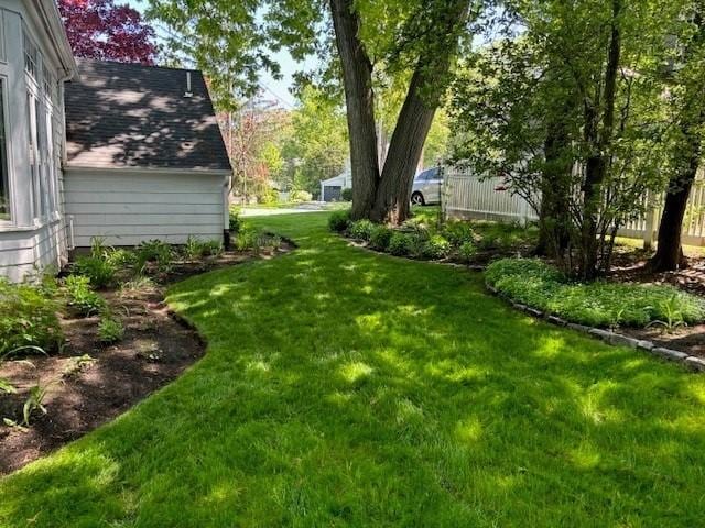 view of yard with fence