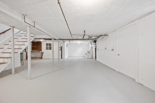 finished basement featuring stairway