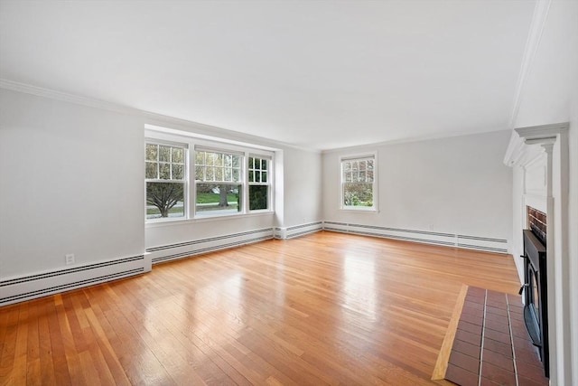 unfurnished living room featuring crown molding, a baseboard radiator, a fireplace with flush hearth, and wood finished floors