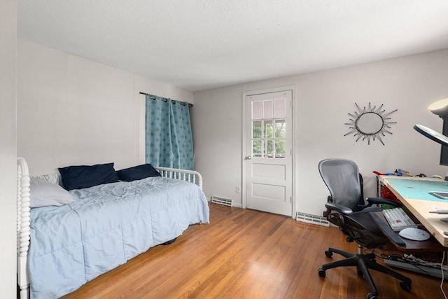 410 Central St, Acton, MA 01720 - bedroom with wood finished floors and an office area