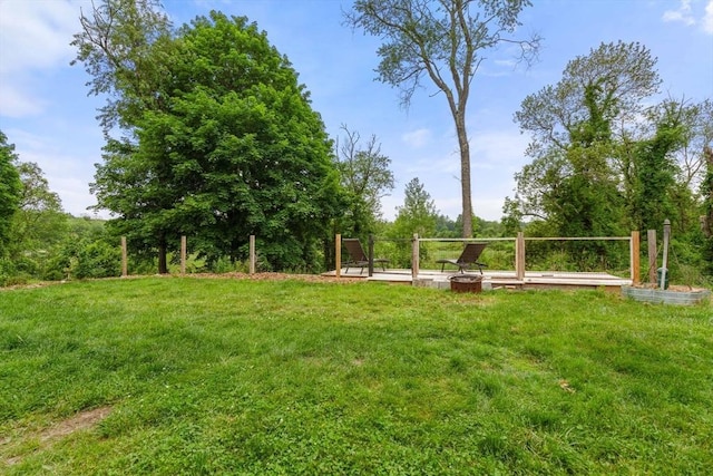 410 Central St, Acton, MA 01720 - view of grassy yard with an outdoor fire pit