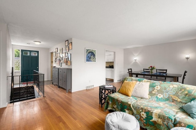 410 Central St, Acton, MA 01720 - living area with light wood-type flooring and baseboards