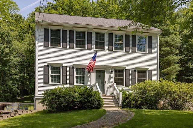 67 Madison St, Amesbury, MA 01913 - colonial-style house with a front yard