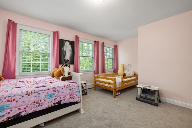 67 Madison St, Amesbury, MA 01913 - bedroom with a baseboard heating unit and carpet