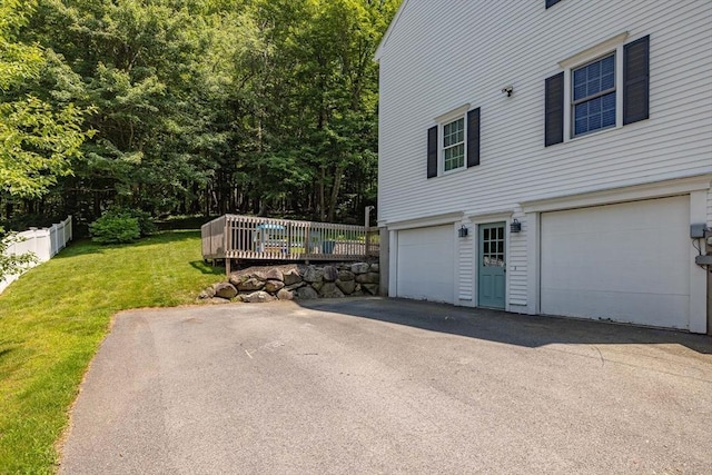 67 Madison St, Amesbury, MA 01913 - view of home's exterior featuring a garage