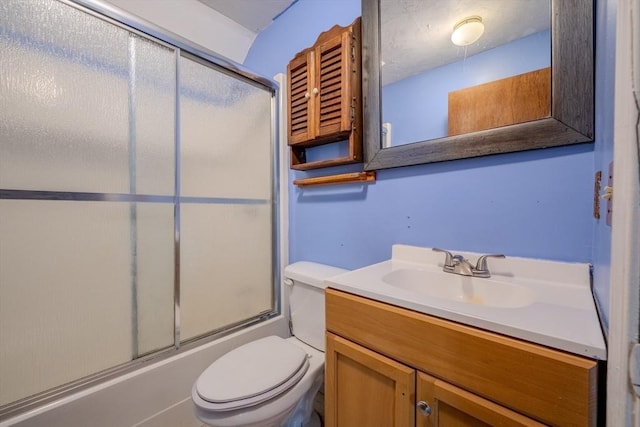 full bath with toilet, vanity, and enclosed tub / shower combo