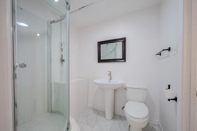bathroom featuring a shower stall, toilet, baseboards, and marble finish floors