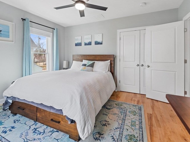 38 Oneil St, Hudson, MA 01749 - bedroom with light wood-style flooring, a closet, and ceiling fan
