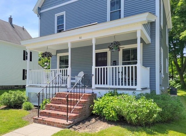 38 Oneil St, Hudson, MA 01749 - entrance to property featuring covered porch and central AC