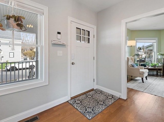 38 Oneil St, Hudson, MA 01749 - foyer with baseboards and wood finished floors