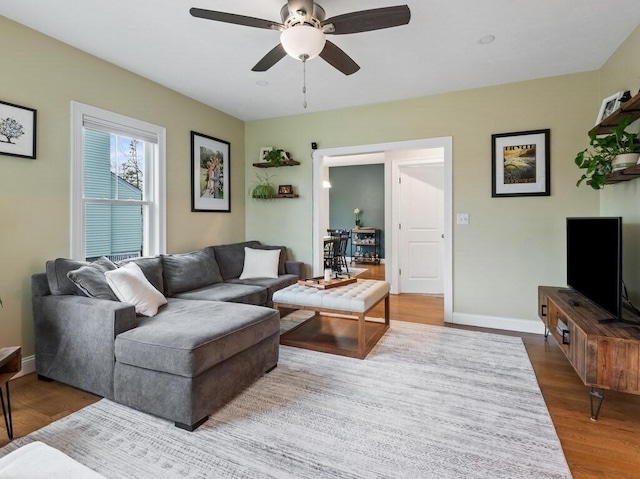 38 Oneil St, Hudson, MA 01749 - living area featuring wood finished floors, ceiling fan, and baseboards