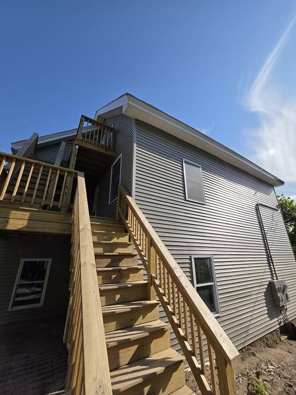 view of property exterior with stairs