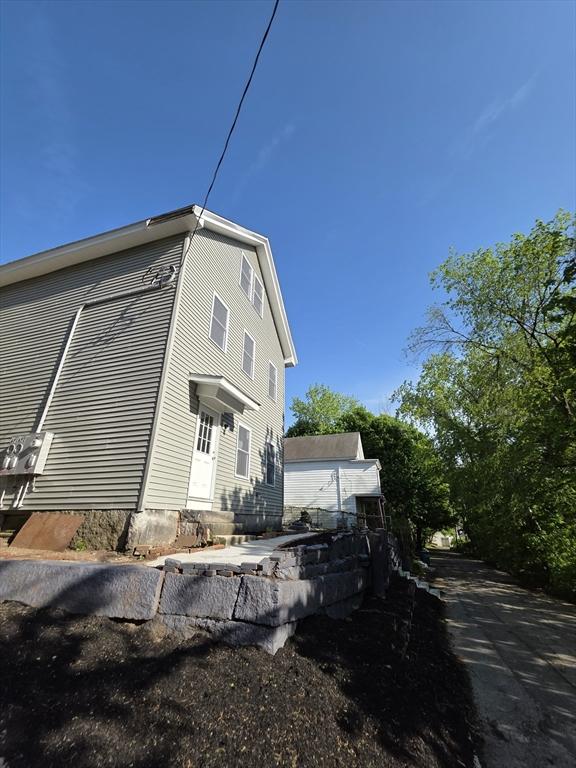 view of home's exterior with entry steps