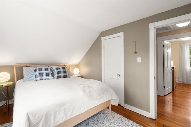 12 Fern St, Chelmsford, MA 01824 - bedroom featuring wood finished floors and vaulted ceiling