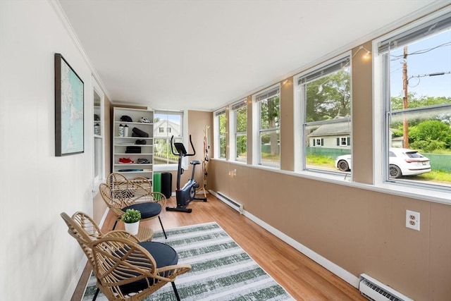 12 Fern St, Chelmsford, MA 01824 - sunroom with a baseboard heating unit and wood finished floors