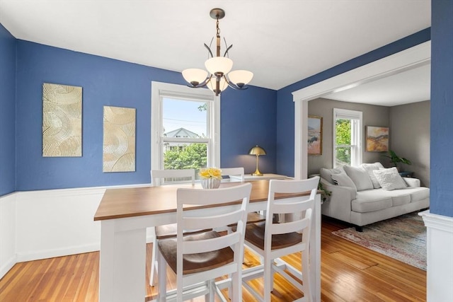 12 Fern St, Chelmsford, MA 01824 - dining space with a chandelier and wood finished floors