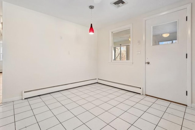 spare room featuring baseboard heating