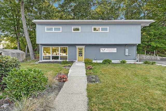 view of front of home with a front yard