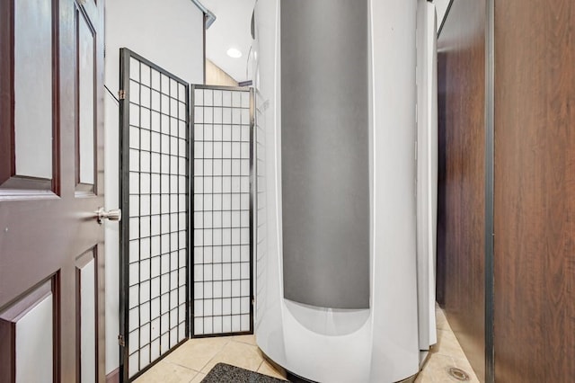 bathroom with tile patterned flooring