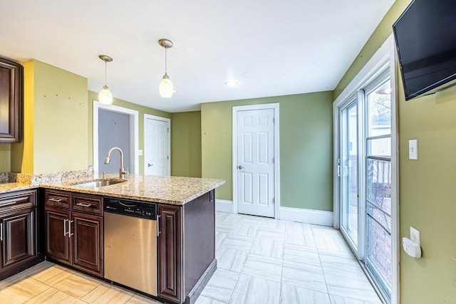 kitchen with sink, dishwasher, kitchen peninsula, and decorative light fixtures