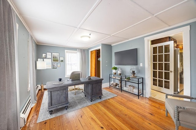 home office featuring coffered ceiling, a baseboard heating unit, and wood-type flooring