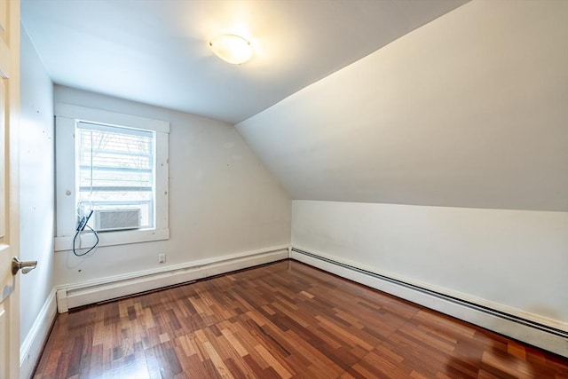 bonus room with hardwood / wood-style flooring, baseboard heating, cooling unit, and lofted ceiling