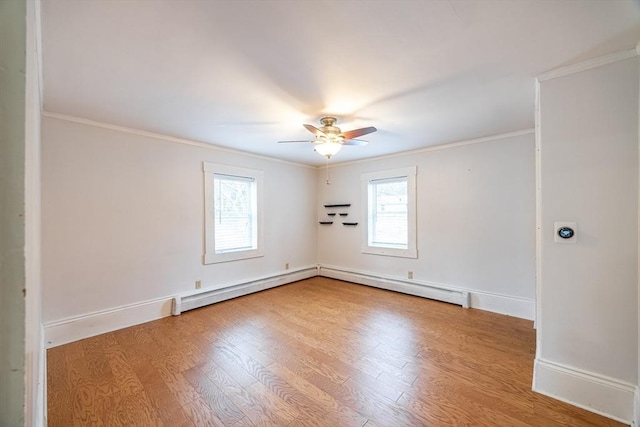 unfurnished room with a baseboard heating unit, ceiling fan, ornamental molding, and wood-type flooring