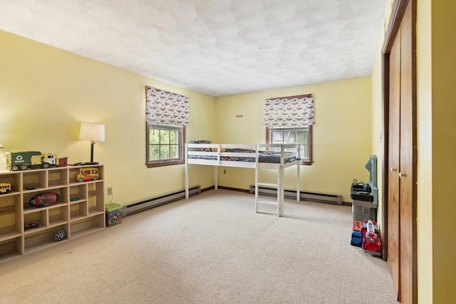 15 Dale St, Methuen, MA 01844 - bedroom with baseboard heating, carpet, and a textured ceiling