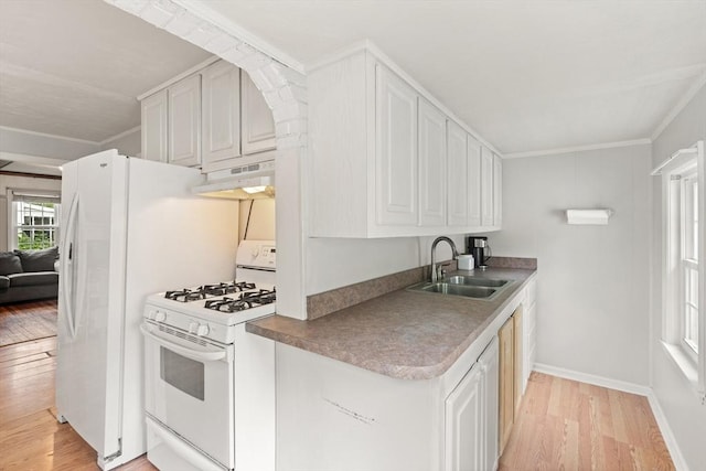 15 Dale St, Methuen, MA 01844 - kitchen featuring white gas range oven, a sink, under cabinet range hood, light wood finished floors, and crown molding