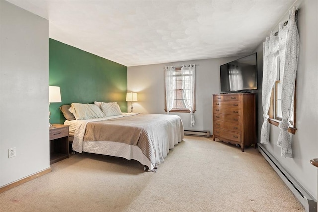 15 Dale St, Methuen, MA 01844 - carpeted bedroom with a baseboard heating unit and baseboards