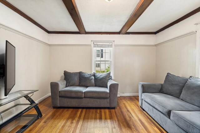 15 Dale St, Methuen, MA 01844 - living area with hardwood / wood-style floors, baseboards, and beamed ceiling