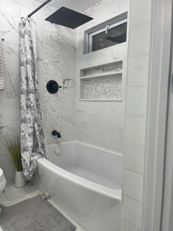 22 2nd Ave, Leominster, MA 01453 - full bathroom featuring shower / bathtub combination with curtain and toilet
