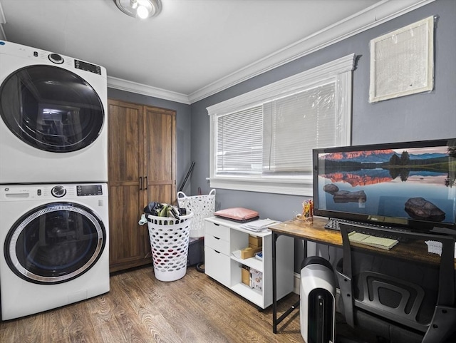 22 2nd Ave, Leominster, MA 01453 - laundry room featuring stacked washer / dryer, wood finished floors, and ornamental molding