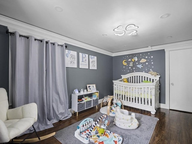 22 2nd Ave, Leominster, MA 01453 - bedroom with ornamental molding, a nursery area, wood finished floors, and baseboards