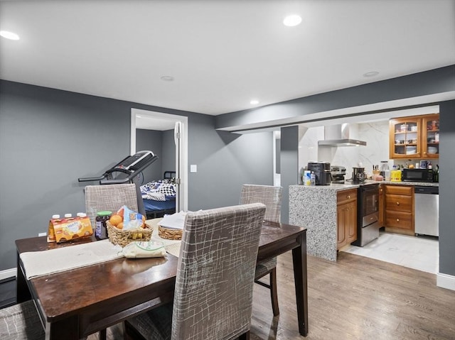 22 2nd Ave, Leominster, MA 01453 - dining space with light wood-style floors and recessed lighting