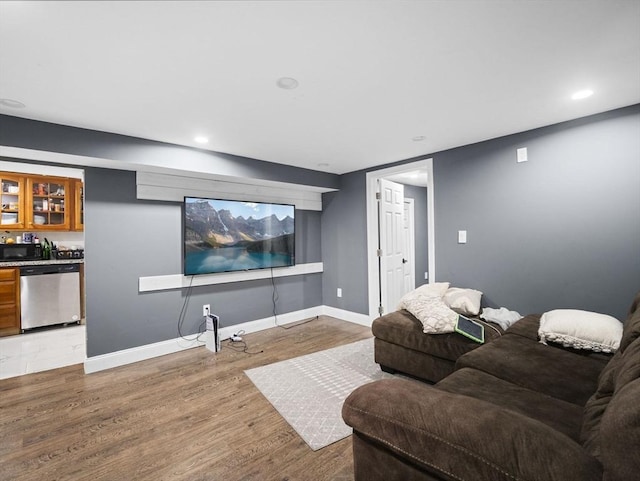 22 2nd Ave, Leominster, MA 01453 - living room with light wood-style flooring, baseboards, bar area, and recessed lighting
