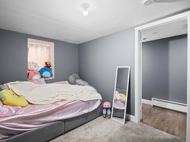 22 2nd Ave, Leominster, MA 01453 - carpeted bedroom featuring a baseboard radiator and baseboards