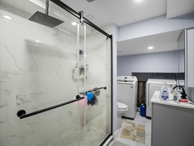 22 2nd Ave, Leominster, MA 01453 - full bath with a marble finish shower, washer and clothes dryer, toilet, vanity, and marble finish flooring