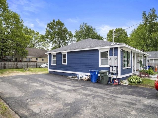 22 2nd Ave, Leominster, MA 01453 - rear view of property with a shingled roof