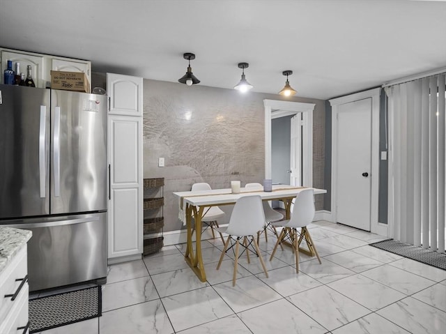 22 2nd Ave, Leominster, MA 01453 - dining room featuring light marble finish floors