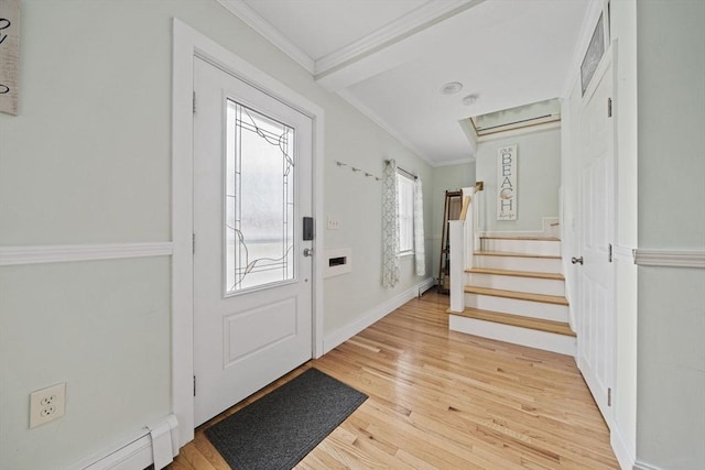 foyer featuring crown molding, a baseboard radiator, and light hardwood / wood-style floors