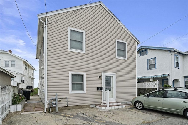 rear view of property with a patio area