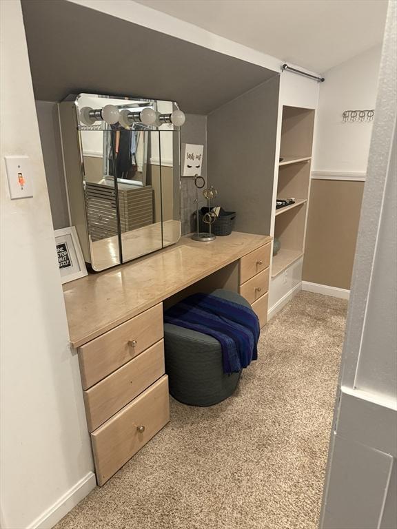 spacious closet featuring carpet