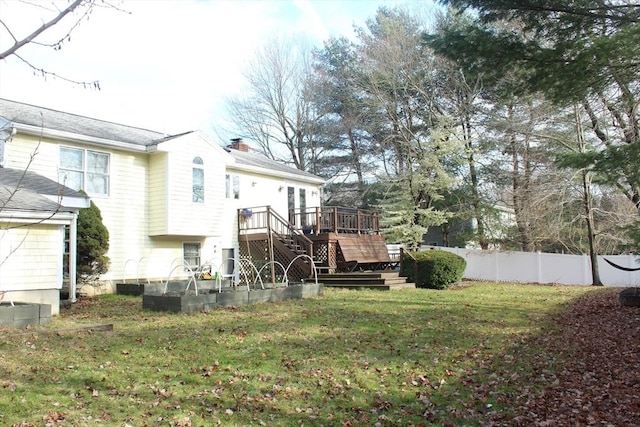 view of yard featuring a wooden deck