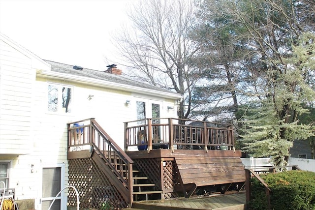 back of house featuring a deck