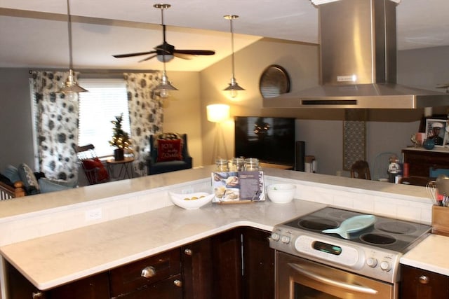 kitchen featuring stainless steel range with electric stovetop, exhaust hood, ceiling fan, decorative light fixtures, and dark brown cabinetry