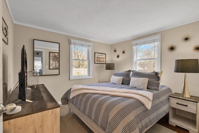 bedroom featuring carpet floors and ornamental molding