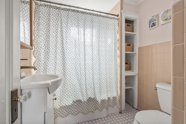 35 Ocean Ave Unit 3, Salem, MA 01970 - bathroom featuring tile walls, vanity, shower / bath combination with curtain, and crown molding