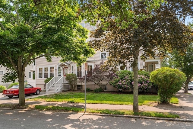 35 Ocean Ave Unit 3, Salem, MA 01970 - view of property hidden behind natural elements with a front lawn